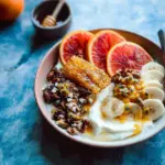 Winter Citrus Ricotta Breakfast Bowl with Honeycomb.